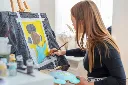 artist-drawing-fashion-art-denim-jacket-sunny-tailor-workshop-with-acrylic-paints-easel_73169-923.webp